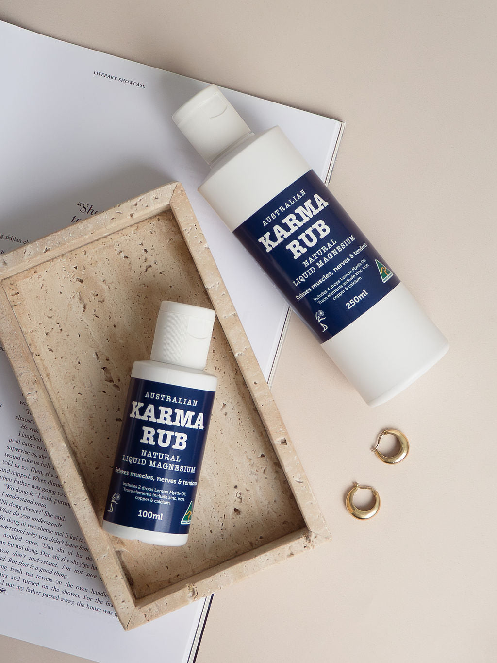 Liquid magnesium in 100ml bottles from Karma Rub Liquid Magnesium, showing the product packaging and bottles.