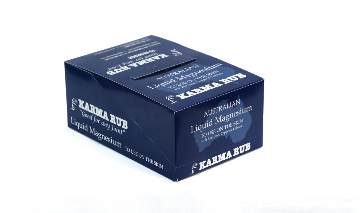 Closed box of 24 Karma Rub Liquid Magnesium 45ml bottles, a natural liquid magnesium supplement for relaxation and muscle support.